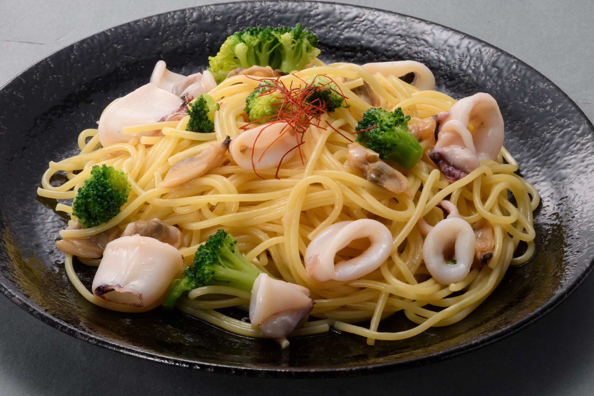 ヤリイカとあさりのバター醤油炒め＋パスタ