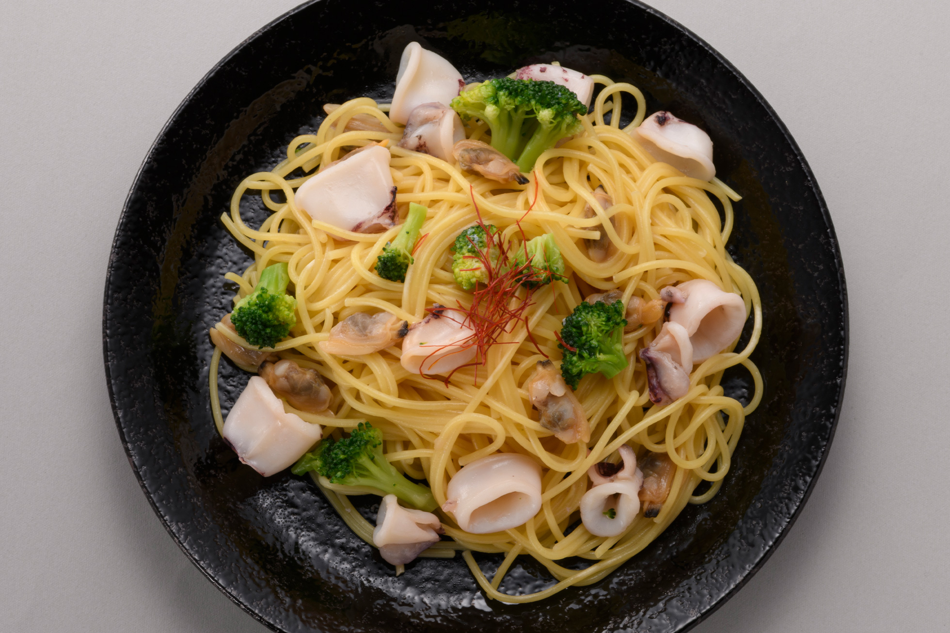 ヤリイカとあさりのバター醤油炒め＋パスタ